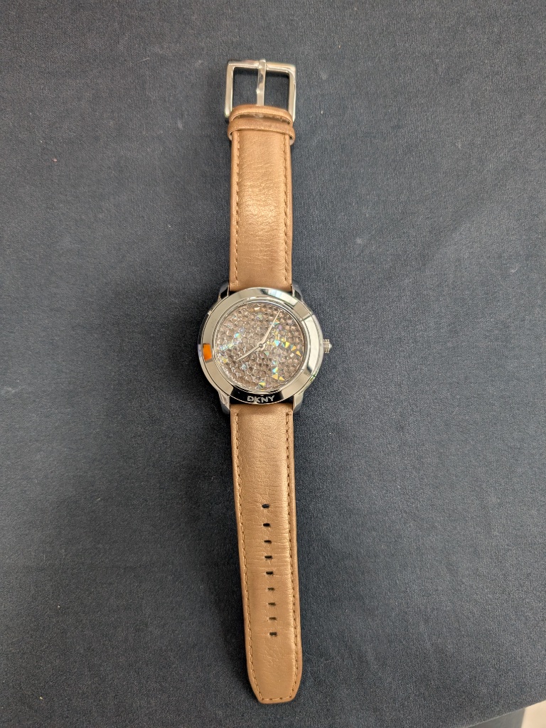 Dkny Silver Tone Camel Tan Leather Band Glidtz Dial Watch For Woman